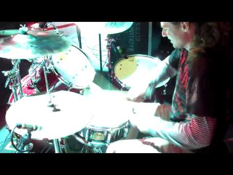 Drummer Timothy Java playing drums on Your Every Day Disaster with Darkest Hour