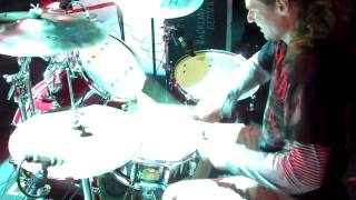 Drummer Timothy Java playing drums on Your Every Day Disaster with Darkest Hour