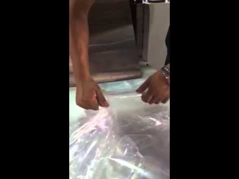 Plastic long sleeve veterinary glove making machine