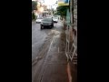Young Girl Plays In The Rain During Hurricane Chantal In La Romana Dominican Republic By JFM