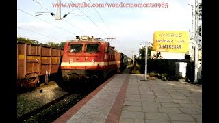 preview picture of video 'LGD WAP4 22747 Shridi Express overtakes coal freight at Ghatkesar.'