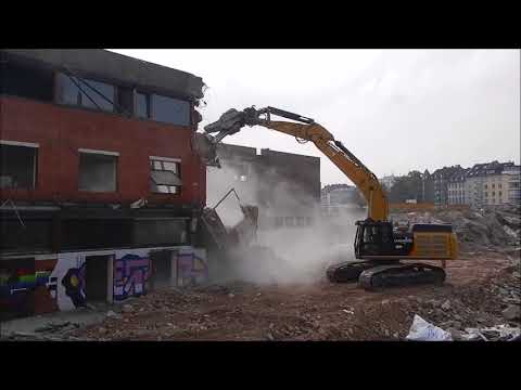 Excavator Cat 352F XE demolition site