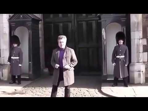 Dancing tourist is scared off by a VERY Scots Guard