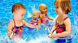 Kids Play Dolls &amp; feeding Baby Dolls at the swimming pool - Family fun video