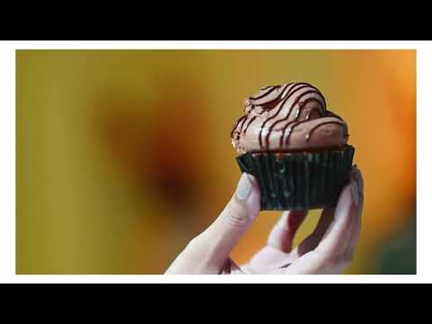 Chocolate cupcake with a touch of sensational hand modelling.