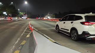 Download lagu A nighttime view of a transaction at a toll gate.  mp3