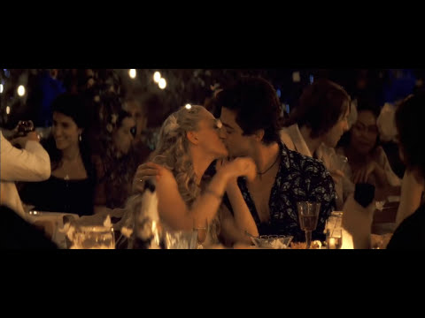 Mamma Mia! 2008 movie trailer still featuring Donna and Sophie on the Greek island
