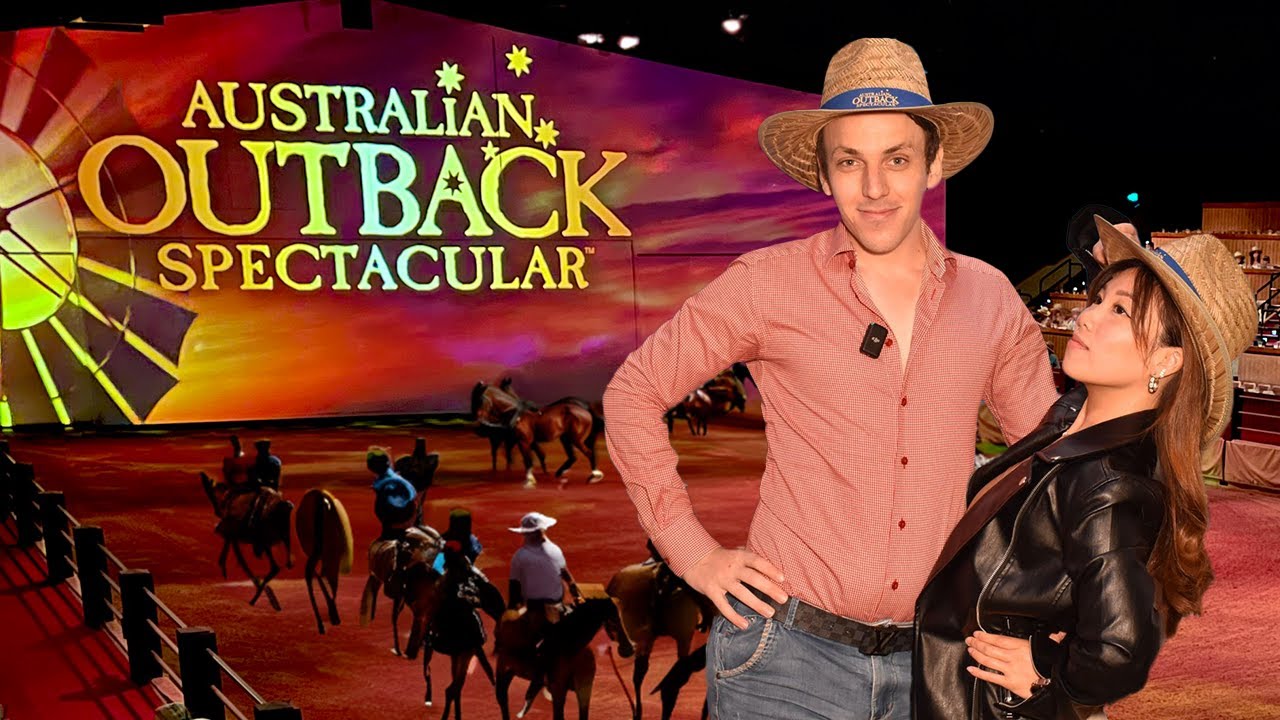 A duo immerses themself in Australian Outback Spectacular show.