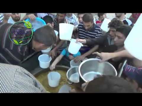 توزيع وجبات طعام في حرستا في ريف دمشق من قبل المكتب الإغاثي الموحد في الغوطة الشرقية
