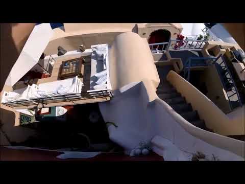 We cross the city of Oia to Santorini by the roofs