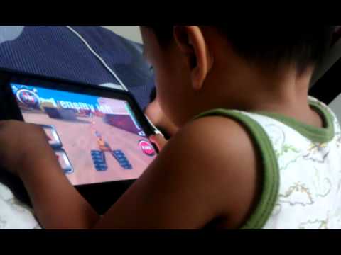 Leon playing ipad tanks (endi)