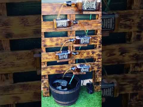 DIY Jack Daniels water fountain! #palletproject #mancave #mancaveideas #jackdaniels #palletwoood