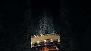 Night flow off back of Carnival Magic up in
