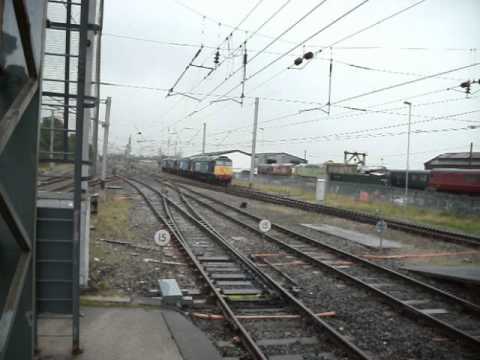 DRS 37194 and 37688 pushing 57011 and 57007 round the back of Carnforth station 16th September 2011