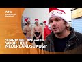Surfende kerstmannen in Noordzee halen geld op voor KNRM
