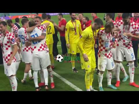 Luka Modric and the Croatian National Team celebrate their Bronze Medal victory over Morocco.