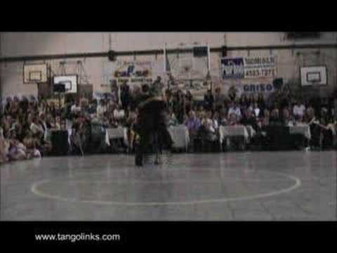  Andrea Misse  and  Javier Rodriguez  are  dancing  to  the  milonga  "  Historia Sentimental  "