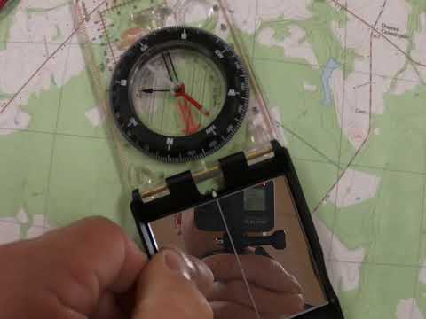 Using a Silva Ranger compass in conjunction with a USGS topographic map to find direction