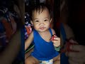 Baby Monica Eating Hotdog