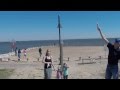 Feeding Seagulls At The Beach