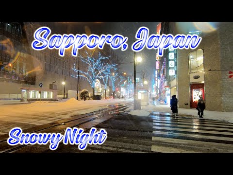 Walking in Hokkaido, Japan. Walk to Susukino from Odori at Snowy Night in Sapporo. ORANGE ua