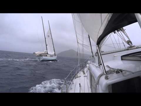 A cat ketch sailing past us