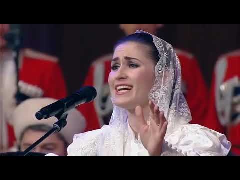 Видео  «Колокольный звон» Сл.иеромонаха Романа, муз. В. Захарченко Исполняет мужская группа хора, солистка засл. арт. Кубани Софья Бовтун (из концертной программы «Россия спасется, знайте!», Московский международный Дом музыки, 2019 год)