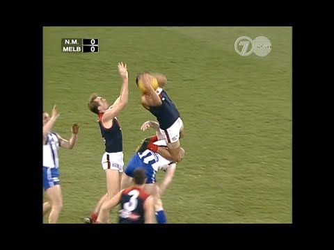 Jeff Farmer takes a screamer in the opening minute of the 1998 Preliminary Final - Melbourne