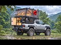 Camping in HEAVY RAIN 🌧️ First Trip with a NEW Truck Camper