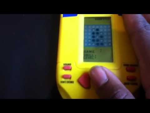 1995 Milton Bradley Electronic Hand-Held Connect Four Game