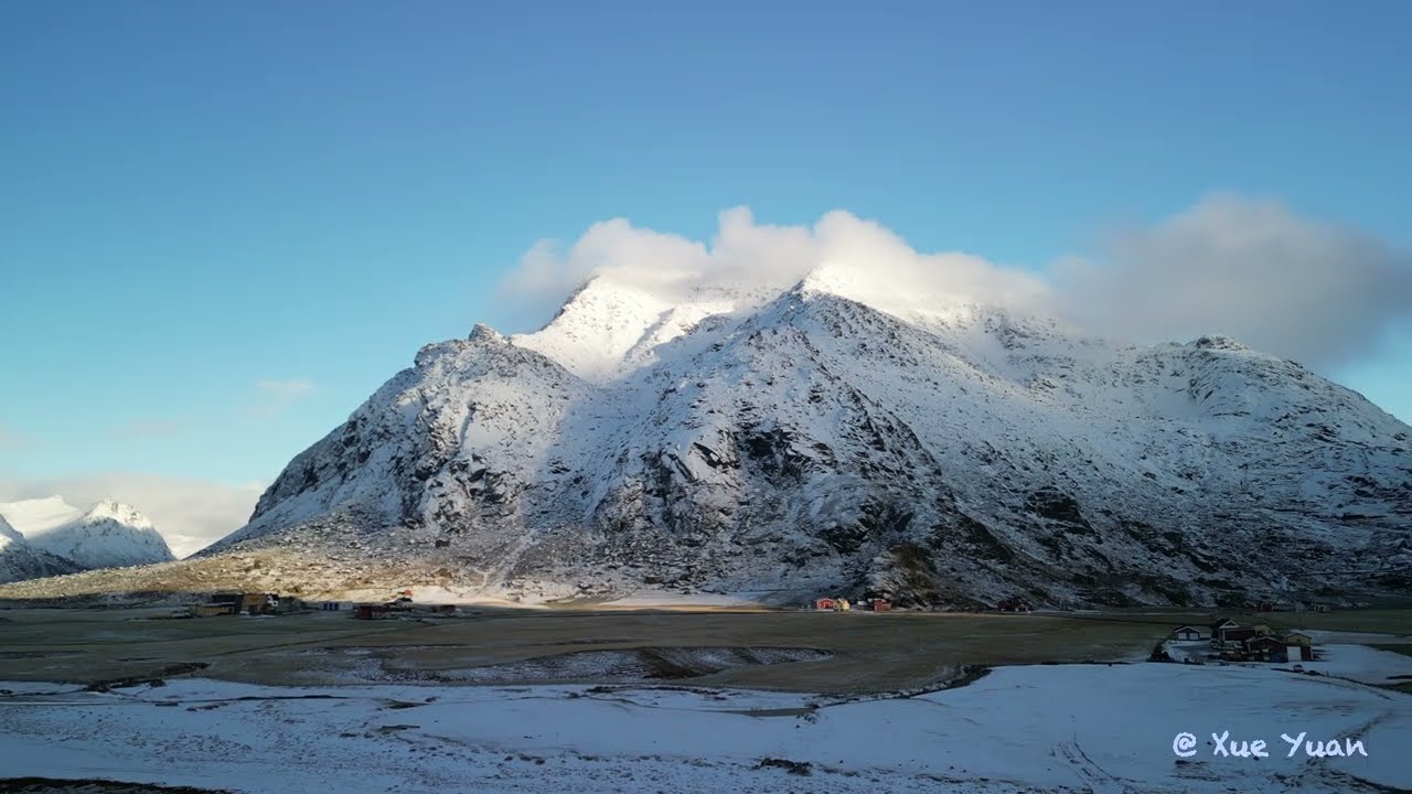 Discover Uttakleiv Beach from the air, where every frame captures its beauty.