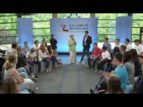 Girl cries after Merkel response on deportations