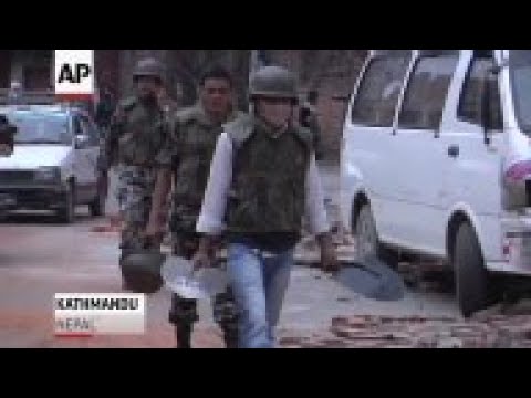 A day after a massive Himalayan earthquake killed more than 2,200 people, rescue efforts continued f