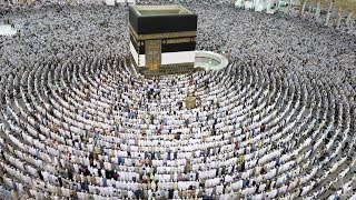 Thousands of Muslim worshippers perform prayers ar