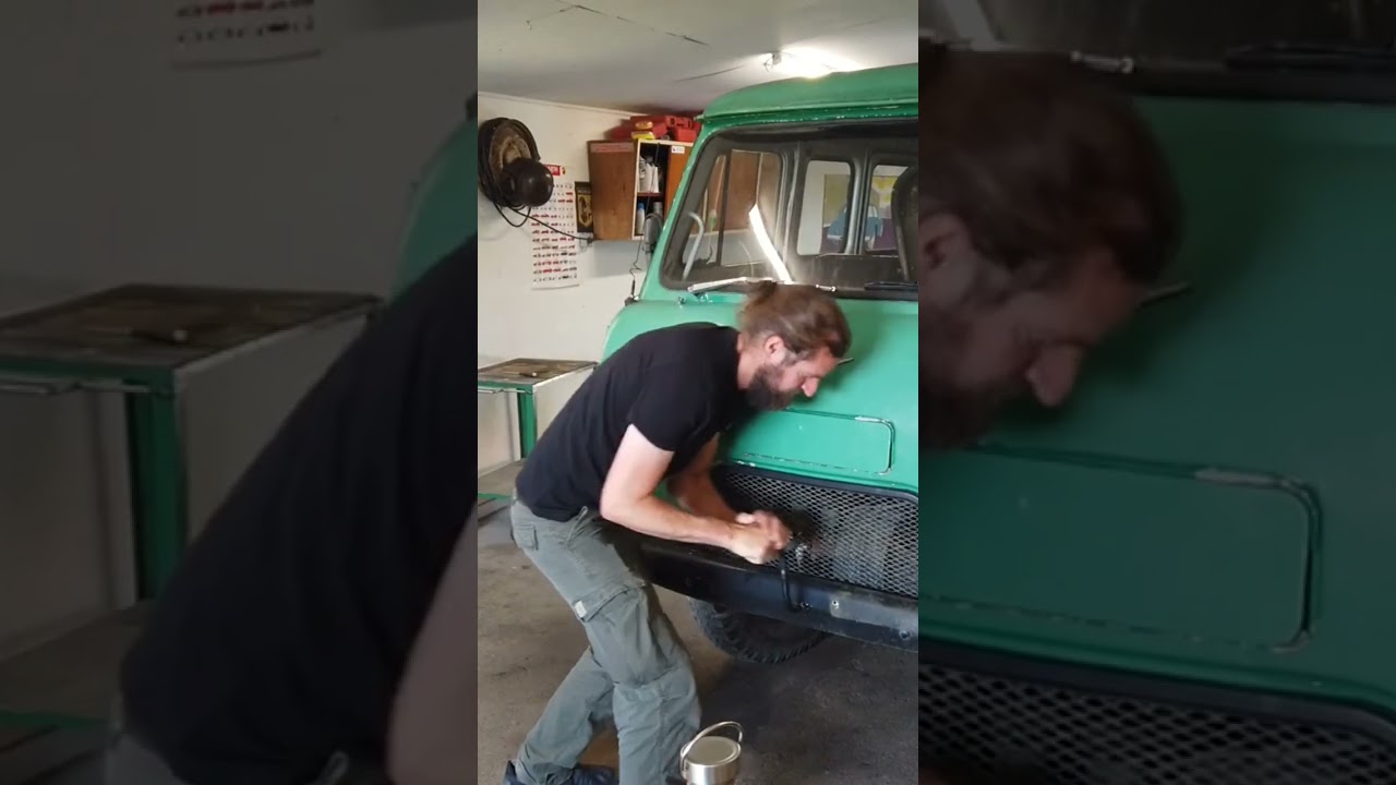 hand cranking a UAZ Buhanka