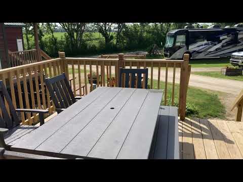 Deluxe Cabin patio swing, shared fenced in dog yard, custom deck