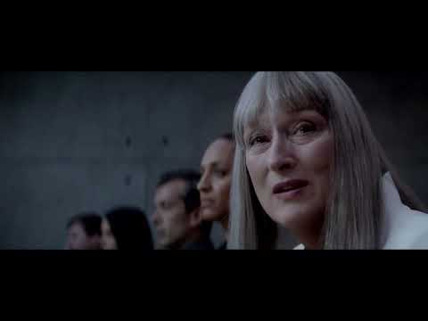 The Giver (2014) official trailer frame with Jonas facing the boundary of his monochrome world