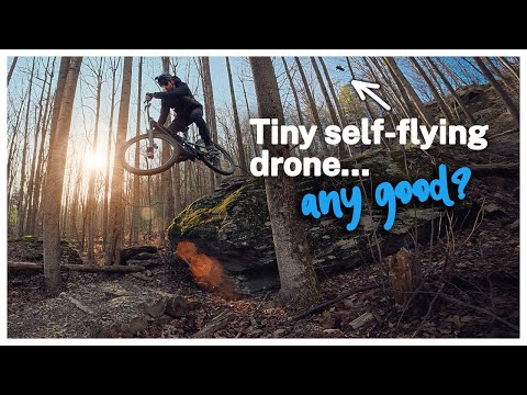 Does the self flying drone, the HOVERAir X1 PROMAX actually work? Can it fly in the woods for MTB?