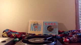 Cake - What's Now Is Now (Clear Vinyl)