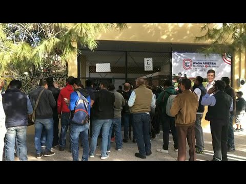 Parents gather outside of elementary school after shooting | AFP