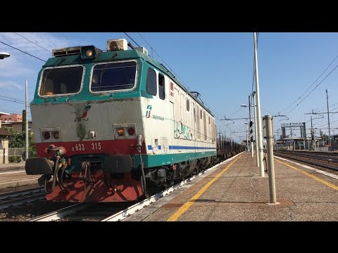 E.633-215 + CARRI PIANALE CON ACCIAIO TRANSITO STAZIONE DI MILANO G. P.