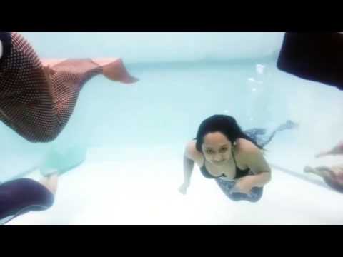 Indonesian mermaids and mermans dancing in the water