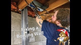 Watch video: PowerBrace Installation, Fixing a Bowing Wall