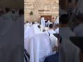Traditional priestly blessing (birkat kohanim) in Sukkot at the Western Wall in Jerusalem. 2025