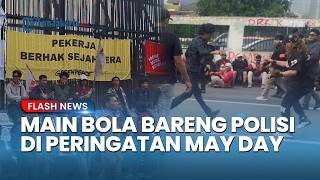 Tak Cuma Demo, Massa Aksi Hari Buruh di Depan DPR Main Bola Bareng Polisi