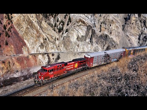 Rail Maintenance And Trains Working In Canada’s Most Dangerous Rock Canyon Along The Thompson River