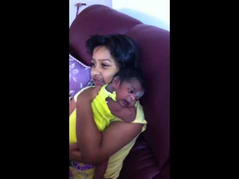 Shravya holding Rasagnya