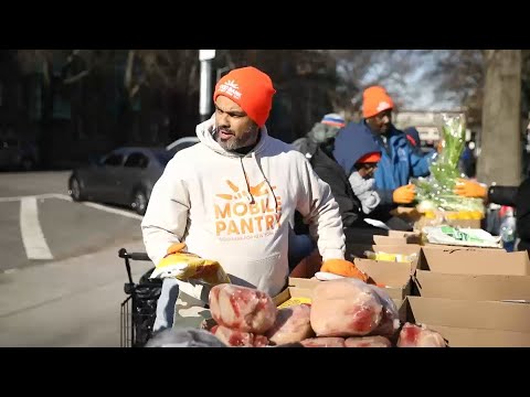 Flight attendant embodying MLK's legacy through volunteerism with Food Bank NYC
