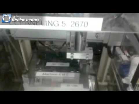 Air Turbine Motors® 740MX milling auto components at 65,000 rpm