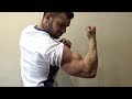 GIANT PUMPED BICEPS RIPS SHIRT OFF